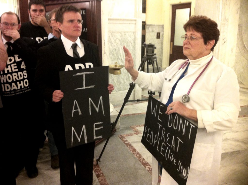 Add the Four Words protest Judy Cross and Ty Carson end of legislative session 2014